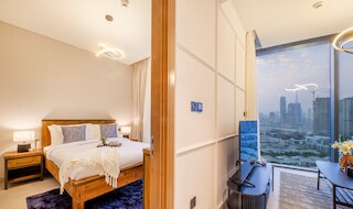 マンジル - スリーク 1BR nr ダウンタウン ウィズ ブルジ ビュー