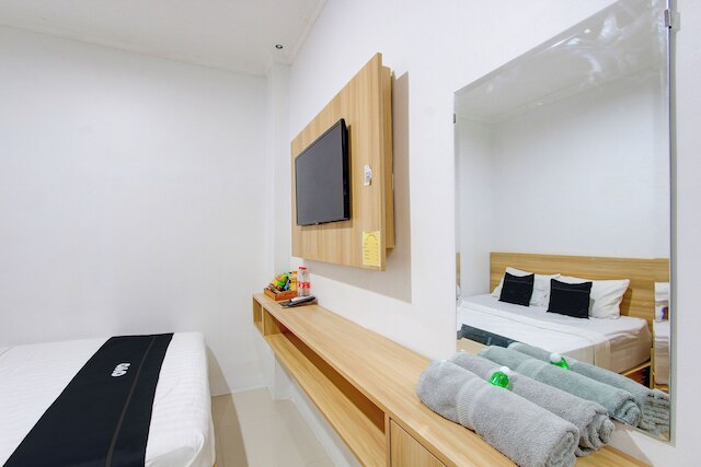 キャピタル O 93266 パルミ  ホテル