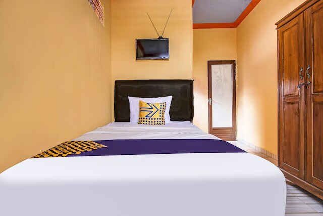 スーパー OYO ライフ 92962 アパートメント セントラランド カラワン バイ ラトナ