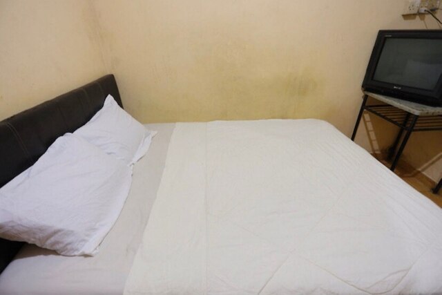 ホテル O レウィ ファミリー ゲストハウス ニア GBKP バングン ムリア Km. 11