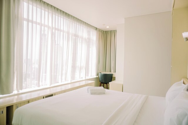 タムリンレジデンスのエレガントでストラテジックな2Brアパートメント