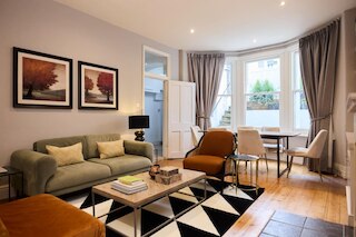 ウェストケンジントンハイドアウト - 庭付きの居心地の良い2ベッドルームフラット