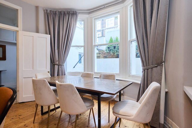 ウェストケンジントンハイドアウト - 庭付きの居心地の良い2ベッドルームフラット