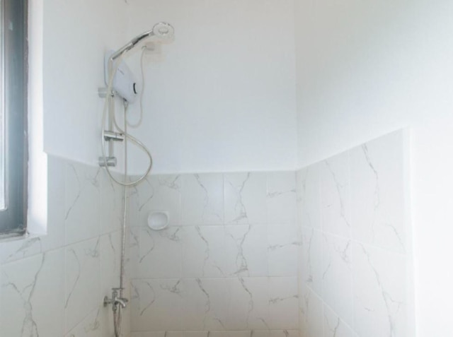 OYO 1087 エンリコス・プレイス・カミアス