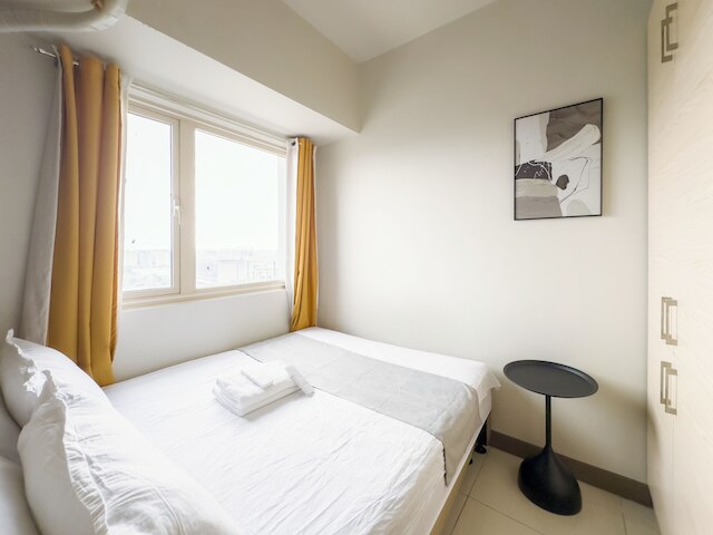 ジェムストーンベッドルーム イン SMDC コースト レジデンス