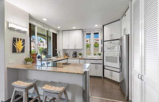 パームズ アット ワイレア 2303 2 ベッドルーム コンド