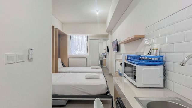 コンパクト スタジオ (ノー キッチン) アパートメント バンダラヤ - タラサ シティ マカッサル