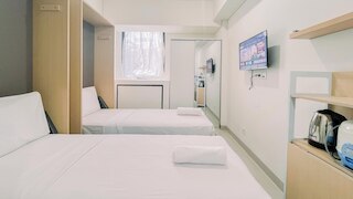 ウォーム アンド コンフィ スタジオ アパートメント (ノー キッチン) バンダラヤ - タラサ シティ マカッサル