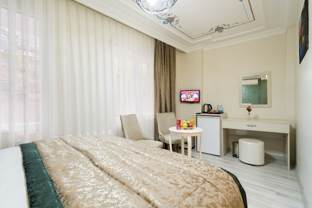 アタム スイーツ & アパート