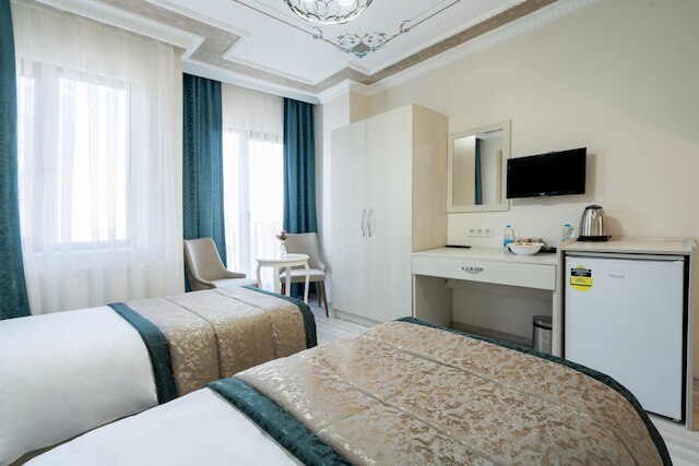 アタム スイーツ & アパート