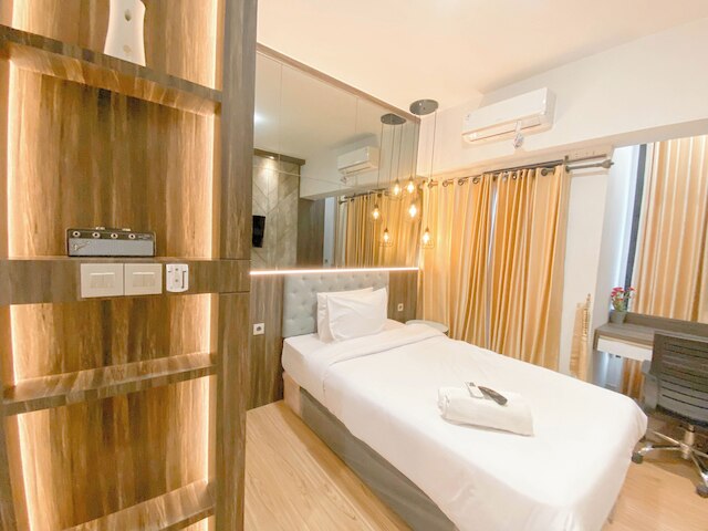 コージー アンド ホーミー スタジオ アット ザ オルトン アパートメント