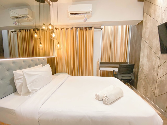 コージー アンド ホーミー スタジオ アット ザ オルトン アパートメント