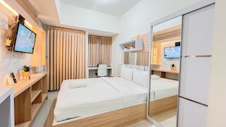 コージー アンド コンパクト スタジオ アパートメント アット ヴィダ ビュー マカッサル