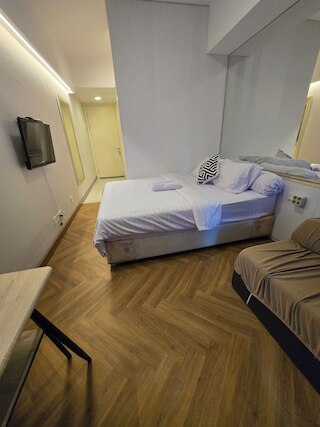 コスミー ベンソン 38 アパートメント