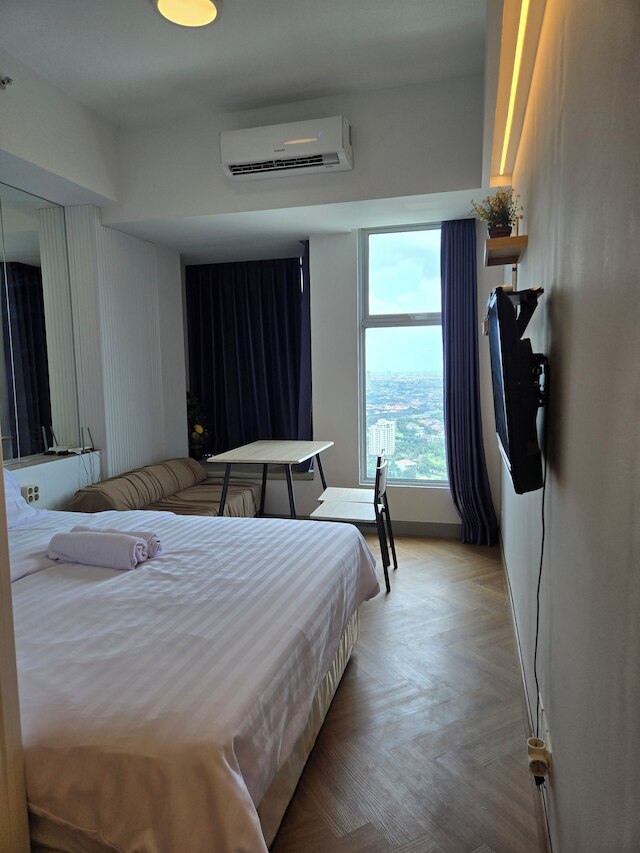 コスミー ベンソン 38 アパートメント