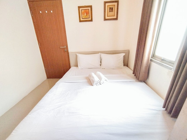 ホーミー アンド プレザント 2ベッドルーム アット パビリオン ペルマタ アパートメント