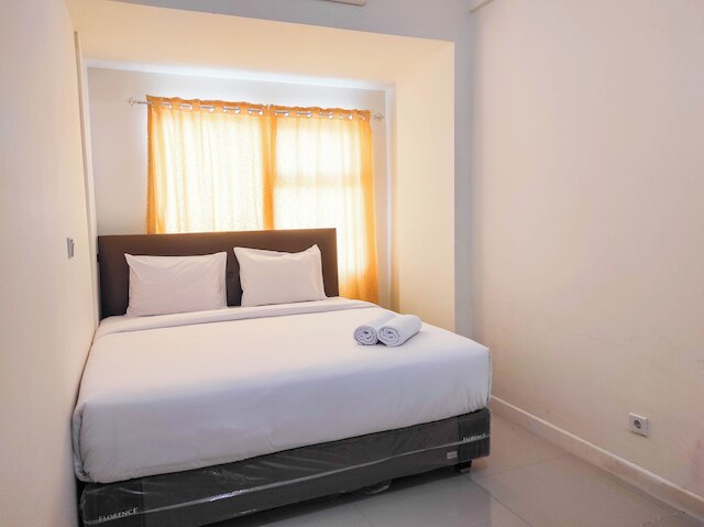 ラグジュリアス 1 ベッドルーム アット ヴィダ ビュー マカッサル アパートメント