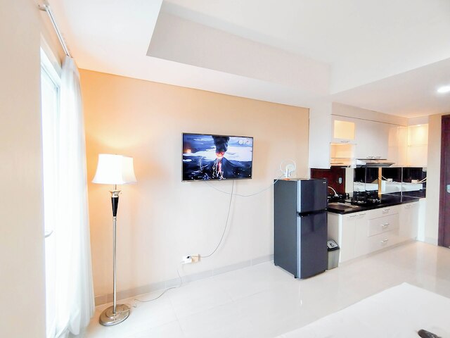 スタニング スタジオ ウィズ ストラテジック ロケーション アット グランド スンコノ ラグーン アパートメント