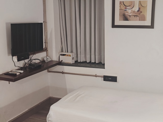 ビトウィーン ザ マンゴー ツリーズ