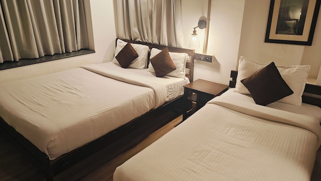 ビトウィーン ザ マンゴー ツリーズ