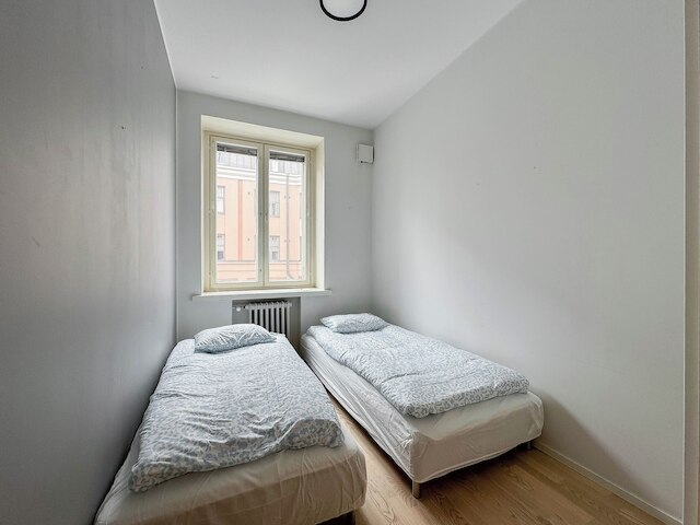 スタイリッシュ ダウンタウン 2BR フラット ウィズ サウナ アンド ワーク エリア