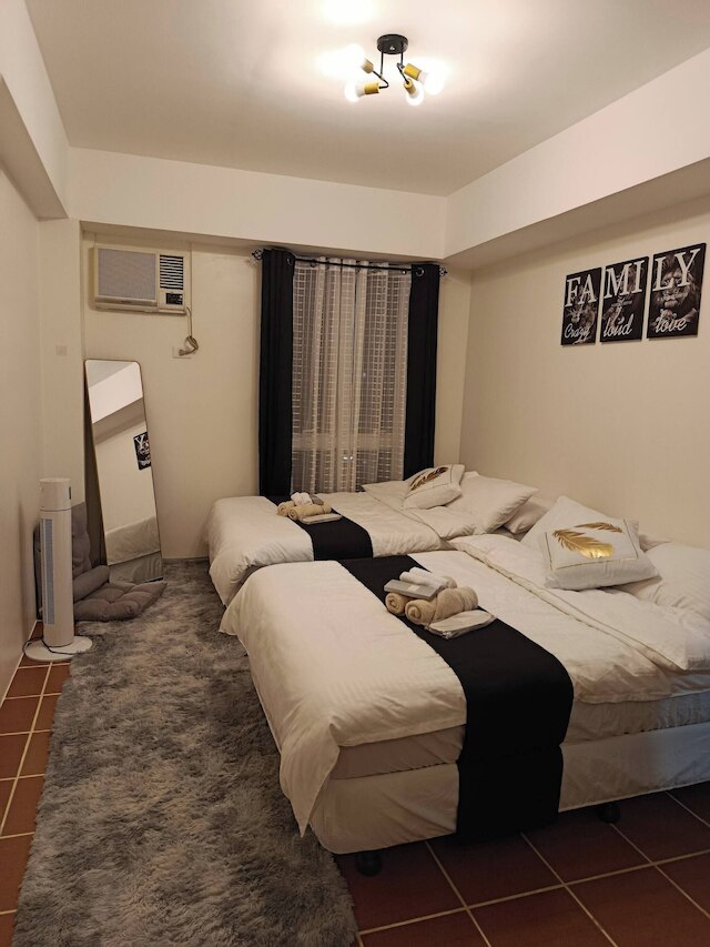 スペーシャス スイート イン パシッグ シティアーバン メトロ エスケープ