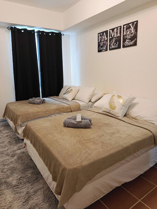 スペーシャス スイート イン パシッグ シティアーバン メトロ エスケープ