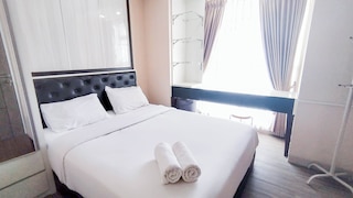 2ベッドルーム アパートメント ニア ウナイア アット タマン メラティ スラバヤ