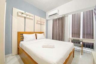 シンプル ホワイト スタジオ アパートメント アット ジ アルトン スマラン