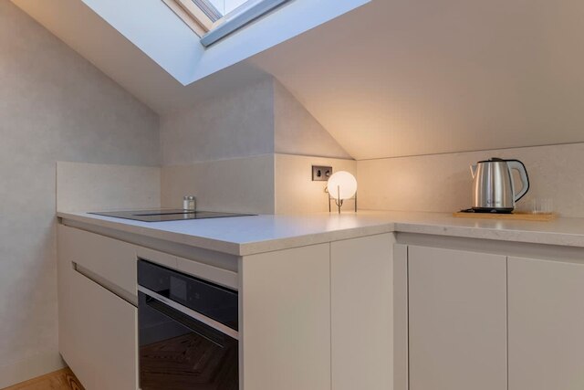 ウィズ コージー ペントハウス アット パラシオ レアル