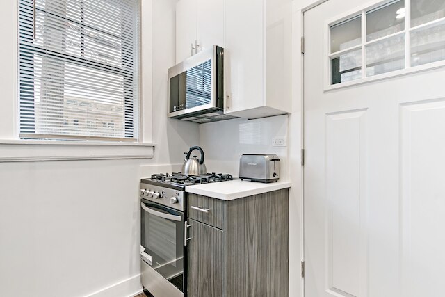 Central 1BR Retreat - Belmont E1