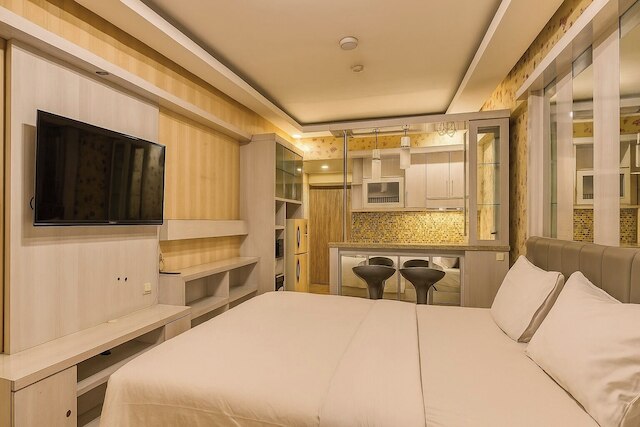 Quintessa Room at Candiland Apartement