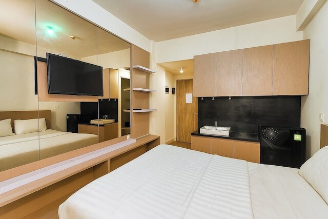 Quintessa Room at Candiland Apartement