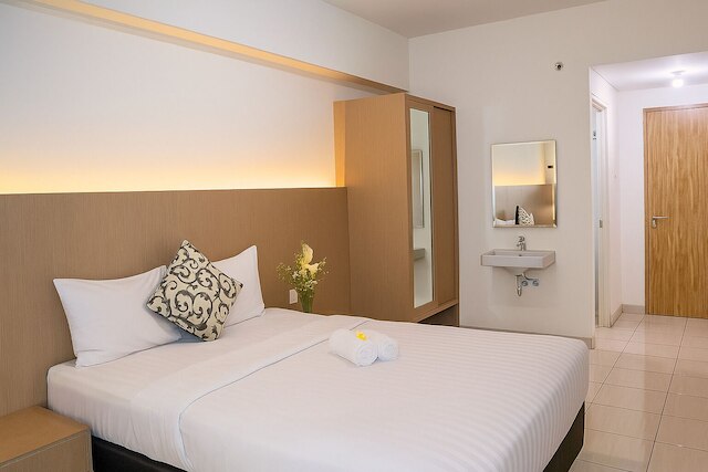 Quintessa Room at Candiland Apartement