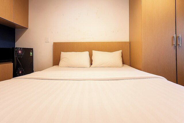 Quintessa Room at Candiland Apartement