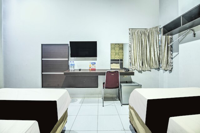 OYO 94781 Hotel Lucky Inn Makassar
