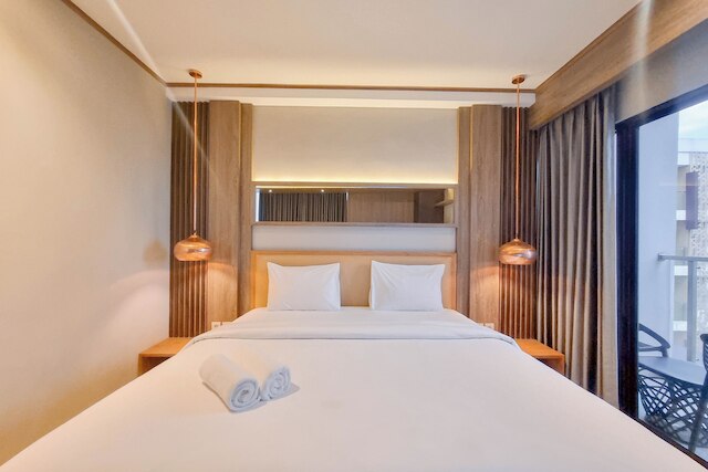 Warm And Minimalist Studio Apartment At Patraland Amarta