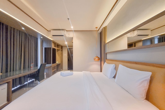 Warm And Minimalist Studio Apartment At Patraland Amarta