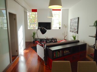 Unwind in Style at Melbourne's Historic Art Deco Apartment With Pool Gym Carpark