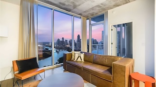 2 Luxury Condos, 1 Block From Rainey St New High Rise w/ Rooftop Pool & Gym