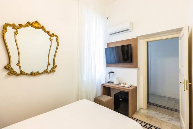 ケポス ルームズ & スイーツ