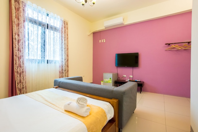 ケンディン ムーチェン イン (墾丁沐晨旅店)