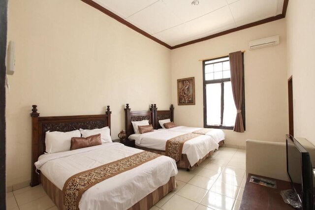 デ ハリムン ゲスト ハウス