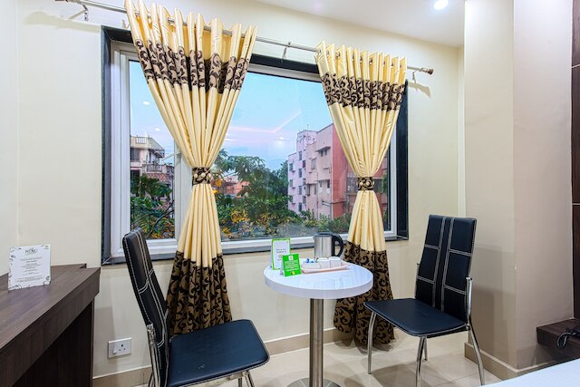 ツリーボー グローブ インターナショナル ニア カリガート マンディル