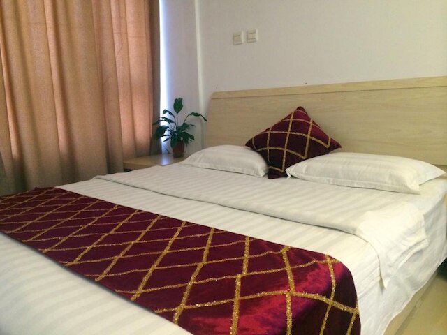 ワンダ ゴールド ドラゴン ホリデイ アパートメント (青岛万达金龙度假公寓)