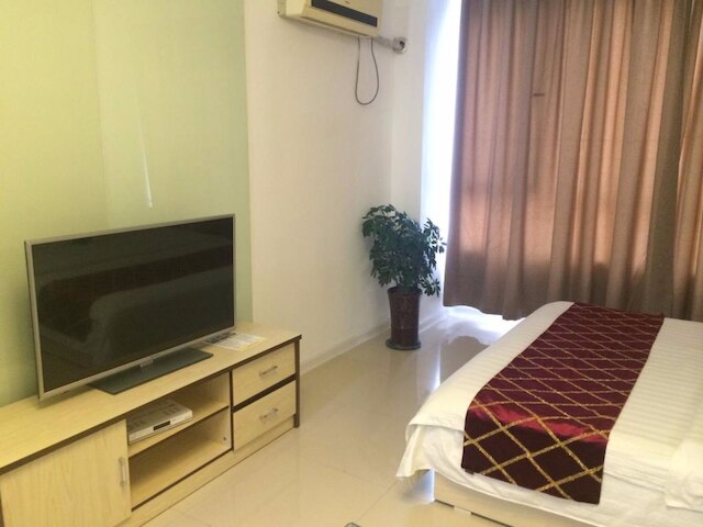 ワンダ ゴールド ドラゴン ホリデイ アパートメント (青岛万达金龙度假公寓)