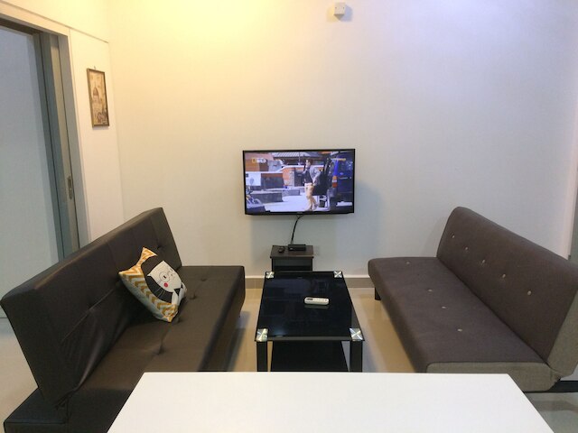 シティ リビング ウィズ パノラミック シー ビューズ アット ダンガ ベイ