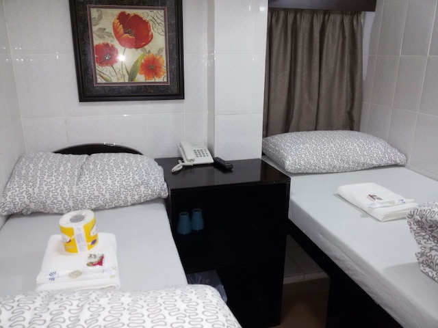 トムズ ゲストハウス