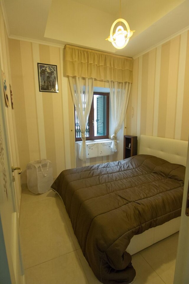 ビナリオ 9 エ トレ クァルティ