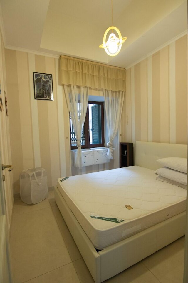 ビナリオ 9 エ トレ クァルティ